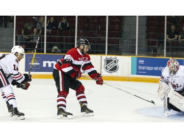 Ottawa 67's #51 Patrick White took an unsuccessful shot on the Niagara IceDogs net at TD Place Arena Sunday February 26, 2017.