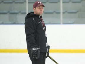 Ottawa Gee-Gees Head Coach Patrick Grandmaitre preps his players during practice at University of Ottawa, January 31, 2017.