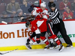 Viktor Stalberg, midle, and Cody Ceci were opponents when the Hurricanes and Senators met at Canadian Tire Centre on Nov. 1, but will now be teammates following Tuesday's trade. Errol McGihon/Postmedia