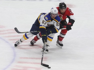 The Ottawa Senators took on the St. Louis Blues at Canadian Tire Centre in Ottawa Tuesday Feb 7, 2017. Ottawa Senators Cody Ceci tries to tie up St. Louis Blues David Perron during first period action Tuesday.  Tony Caldwell