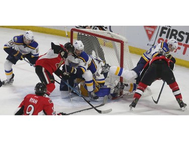 The Ottawa Senators took on the St. Louis Blues at Canadian Tire Centre in Ottawa Tuesday Feb 7, 2017. Loose puck on front of the St. Louis Blues goalie during second period action against the Senators Tuesday.  Tony Caldwell