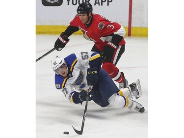 The Ottawa Senators took on the St. Louis Blues at Canadian Tire Centre in Ottawa Tuesday Feb 7, 2017. St. Louis Blues David Perron gets taken down my Ottawa Senators Marc Methot during second period action Tuesday.  Tony Caldwell