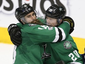Dallas Stars right wing Patrick Eaves (18) celebrates his goal with center Cody Eakin (20) against the Winnipeg Jets during the second period of an NHL hockey game, Thursday, Feb. 2, 2017, in Dallas.