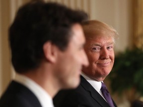 President Donald Trump smiles during a joint news conference with Canadian Prime Minister Justin Trudeau in the East Room of the White House in Washington, Monday, Feb. 13, 2017.