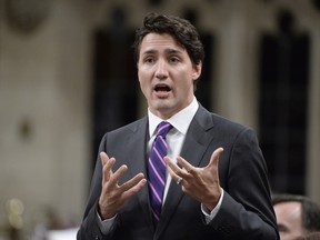 Prime Minister Justin Trudeau answers a question during Question Period in the House of Commons in Ottawa, Tuesday, Jan.31, 2017. Trudeau is abandoning his long-held promise to change the way Canadians vote in federal elections.In a mandate letter for newly appointed Democratic Institutions Minister Karina Gould, Trudeau makes it clear that electoral reform  once top of mind for the Liberal government  is no longer on the agenda. THE CANADIAN PRESS/Adrian Wyld ORG XMIT: AJW500