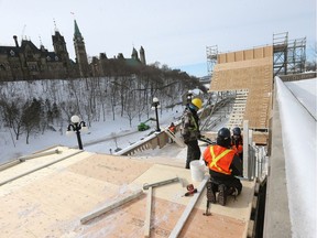 Construction of the Red Bull Crashed Ice course is underway beside the Chateau Laurier in Ottawa.