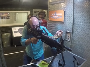 Screen capture from video of Kevin O'Leary firing a machine gun at a Miami gun range.