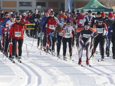 Skiers take part in the 27 km classic style Gatineau Loppet cross-country ski race in Gatineau on Saturday, February 18, 2017.