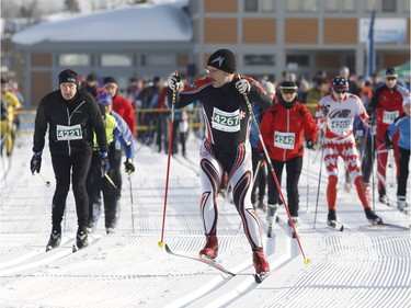 Skiers take part in the 27 km classic style Gatineau Loppet cross-country ski race in Gatineau on Saturday, February 18, 2017.