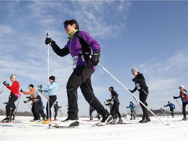 Skiers take part in the 27 km classic style Gatineau Loppet cross-country ski race in Gatineau on Saturday, February 18, 2017.