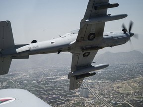 An A-29 Super Tucano of the Afghan Air Force flies over Kabul. The planes provide close air support for Afghan security forces. Photo courtesy USAF