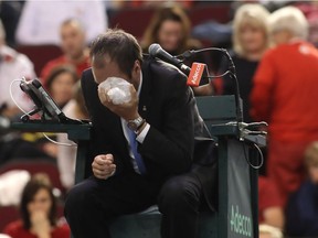 Head referee Arnaud gabas sits with an ice pack on his eye after Denis Shapovalov of Canada accidently hit him with a tennis ball during the third set day of Davis Cup first round between Canada and Great Britain at TD Place in Ottawa, Ontario, February 5, 2017.  Canada forfeited, there for Great Britain wins the series 3-2. /