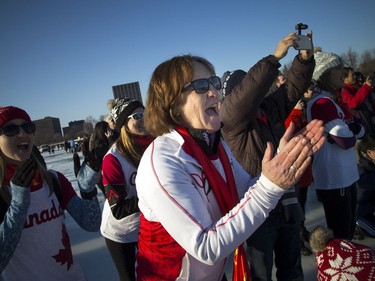 Sue Holloway of the Galley Girls cheers on another women's team after the Galley girls finished first in the women's final.