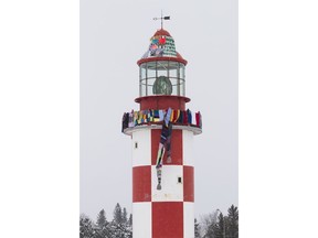 The lighthouse at the Museum of Science and Technology Museum was adorned with knit scarves commemorating Random Act Of Kindness Week February 12-18, 2017.