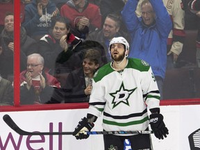 Ottawa Senators fans cheer as Dallas Stars centre Tyler Seguin reacts to his team scoring an own goal during first period NHL action Thursday February 9, 2017 in Ottawa.