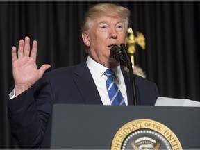 US President Donald Trump speaks at the Major Cities Chiefs Association and Major County Sheriff's Association Winter Meeting in Washington, DC,on February 8, 2017. /