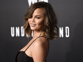 FILE - In this Feb. 28, 2017, file photo, model Chrissy Teigen poses at the season two premiere of the television series &ampquot;Underground&ampquot; in Los Angeles. Teigen revealed in an essay for Glamour magazine published online on March 6, 2017, that she has battled postpartum depression since the birth of her daughter last year. (Photo by Chris Pizzello/Invision/AP, File)