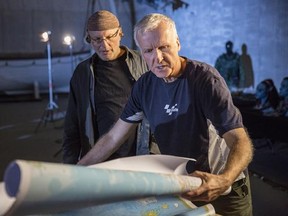 Filmmaker/journalist Simcha Jacobovici (left) and Oscar-winning filmmaker James Cameron are shown in “Atlantis Rising,” premiering Sunday on Discovery. THE CANADIAN PRESS/HO-Discovery Channel-Mark Fellman MANDATORY CREDIT