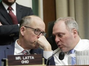 House Energy and Commerce Committee Chairman Rep. Greg Walden, R-Ore., left, confers with House Majority Whip Steve Scalise of La. on Capitol Hill in Washington, Thursday, March 9, 2017. after working through the night to argue the details of the GOP's 'Obamacare' replacement bill.