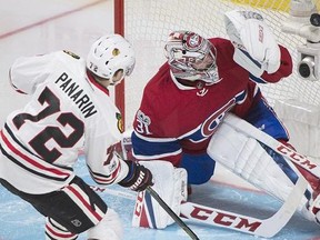 Chicago Blackhawks&#039; Artemi Panarin (72) scores against Montreal Canadiens goalie Carey Price during third period NHL hockey action in Montreal, Tuesday, March 14, 2017.