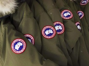 Jackets hang at the factory of Canada Goose Inc. in Toronto on Thursday, November 28, 2013. Canada Goose, whose winter jackets have been made famous by the likes of Daniel Craig and Kate Upton, is going public today on stock markets in Toronto and New York.THE CANADIAN PRESS/Aaron Vincent Elkaim