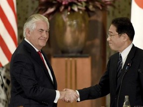 U.S. Secretary of State Rex Tillerson, left, shakes hands with his Japanese counterpart Fumio Kishida at the end of a joint press conference after their talks at the Iikura Guesthouse in Tokyo Thursday, March 16, 2017. Tillerson called on North Korea Thursday to abandon its nuclear and ballistic missile programs, saying the isolated nation &ampquot;need not fear&ampquot; the United States. (Toru Yamanaka/Pool Photo via AP)