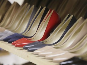 High heels on display in the Pretty Small Shoes store in Bloomsbury, London on March 6, 2017. Servers clad in short skirts and stilettos could soon be a thing of the past, as British Columbia and Ontario take steps to ditch sexualized dress codes. But women in other industries can face unwritten expectations of lipstick and heels, say workplace equality experts. Researchers and human rights lawyers say a broader discussion is needed of the pressures faced by women to spend more time and money on
