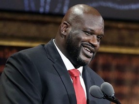 FILE - In this Sept. 9, 2016, file photo, basketball Hall of Fame inductee Shaquille O&#039;Neal speaks during induction ceremonies in Springfield, Mass. O&#039;Neal said on the March 20, 2017, edition of his podcast that he believes the world is flat. (AP Photo/Elise Amendola, File)
