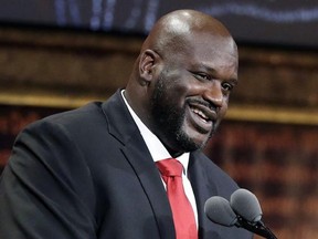 In this Sept. 9, 2016, file photo, basketball Hall of Fame inductee Shaquille O&#039;Neal speaks during induction ceremonies in Springfield, Mass. O&#039;Neal is the latest big name to float one of the more outrageous claims out there -- that the Earth is flat and that we&#039;ve all been manipulated to believe it is round. THE CANADIAN PRESS/AP Photo/Elise Amendola, File
