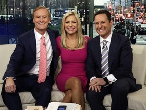 FILE - In this Feb. 29, 2016 file photo, co-hosts Steve Doocy, from left, Ainsley Earhardt and Brian Kilmeade appear on the morning show &ampquot;Fox & Friends&ampquot; in New York. &ampquot;Fox & Friends&ampquot; has emerged as the morning television show of choice for President Donald Trump and his fans. Its average February 2017 audience of 1.72 million viewers was 49 percent over last year‚Äôs, the Nielsen company said. (AP Photo/Richard Drew, File)