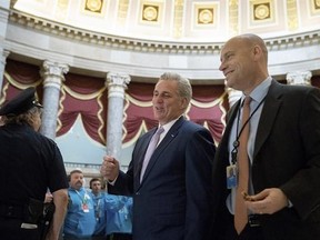 House Majority Leader Kevin McCarthy of Calif., center, walks to the House Chamber on Capitol Hill in Washington, Friday, March 24, 2017, as the House nears a vote on their health care overhaul. (AP Photo/Andrew Harnik)