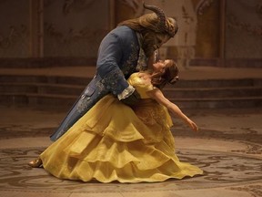 This image released by Disney shows Dan Stevens as The Beast, left, and Emma Watson as Belle in a live-action adaptation of the animated classic &ampquot;Beauty and the Beast.&ampquot; (Disney via AP)
