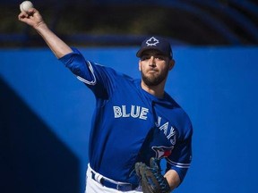 Toronto Blue Jays starting pitcher Marco Estrada throws a bullpen session during baseball spring training in Dunedin, Fla., on Friday, February 17, 2017. The Blue Jays will send Estrada to the mound when they open their Major League Baseball season April 3 at Baltimore.