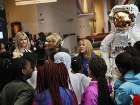 Ivanka Trump, left, Education Secretary Betsy DeVos, center, listens as NASA Astronaut Kay Hire speaks to female students at the Smithsonian&#039;s National Air and Space Museum in Washington, Tuesday, March 28, 2017, to celebrate Women&#039;s History Month. (AP Photo/Manuel Balce Ceneta)