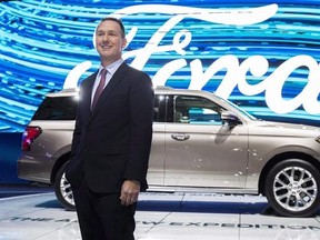 Ford Canada President Mark Buzzell poses in front of the 2017 Ford Expedition during the Canadian International Autoshow in Toronto on Thursday, February 16, 2017. THE CANADIAN PRESS/Mark Blinch