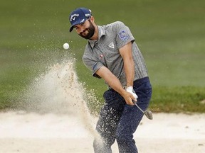 Adam Hadwin chips onto the first green during the final round of the Valspar Championship golf tournament Sunday, March 12, 2017, at Innisbrook in Palm Harbor, Fla. It&#039;s been a crazy month for Canadian golfer Adam Hadwin.The 29-year-old native of Moose Jaw, Sask., captured the Valspar Championship on March 12 for his first career PGA Tour win, then was married less than two weeks later. THE CANADIAN PRESS/AP, Mike Carlson