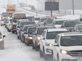 Traffic crawls along Greenbank Road during the morning commute on Friday March 24, 2017. It's just one road where the rules of the road seem to be a suggestion, according to a letter writer. Errol McGihon/Postmedia