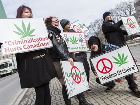 A small group of protesters gathered outside of the Ottawa Courthouse to show support for "budtenders" who were facing charges in March.
