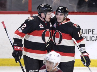 Ottawa Senators Alexandre Burrows (14) celebrates his second goal of the game against the Colorado Avalanche with teammate Dion Phaneuf (2) during second period NHL hockey action in Ottawa, Thursday, March 2, 2017.