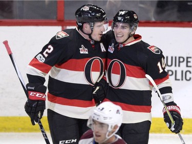 The Ottawa Senators' Alex Burrows (14) celebrates his second goal of the game against the Colorado Avalanche with teammate Dion Phaneuf (2) during the second period at the Canadian Tire Centre on Thursday, March 2, 2017.