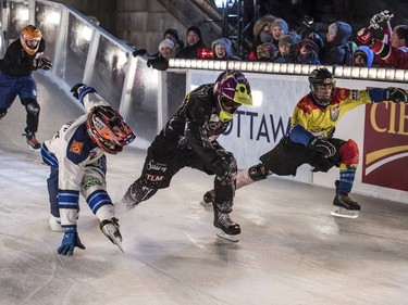 OTTAWA, ON - MARCH 03: In this handout provided by Red Bull, Mirko Lahti of Finland, Joni Saarinen of Finland, Samuel Nadeau of Canada and Petar Sevo of the Netherlands compete during the final of the Juniors Championship at the fourth stage of the ATSX Ice Cross Downhill World Championship at the Red Bull Crashed Ice on March 03, 2017  in Ottawa, Canada.