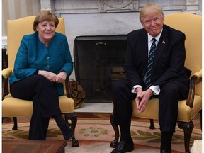 WASHINGTON, DC - MARCH 17: German Chancellor Angela Merkel (L) meets with U.S. President Donald Trump in the Oval Office of the White House on March 17, 2017 in Washington, DC. This is Merkel's first visit to the U.S. under the Trump administration.