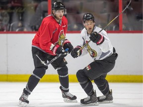Clarke MacArthur, right, skates with Bobby Ryan at Canadian Tire Centre earlier this year.