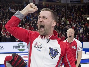 Newfoundland and Labrador skip Brad Gushue reacts after defeating Kevin Koe's Team Canada 7-6 to win the Tim Hortons Brier in St. John's on Sunday night.