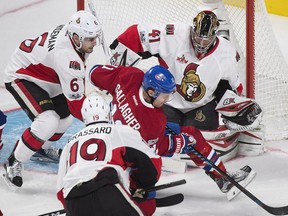 Montreal's Brendan Gallagher moves in on Ottawa goaltender Craig Anderson between Chris Wideman (6) and Derick Brassard during of Sunday's game at Montreal.