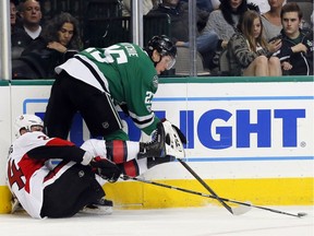 Ottawa Senators' Viktor Stalberg (24) of Sweden attempts to control a puck under pressure from Dallas Stars' Brett Ritchie (25) in the second period of an NHL hockey game in Dallas, Wednesday, March 8, 2017.