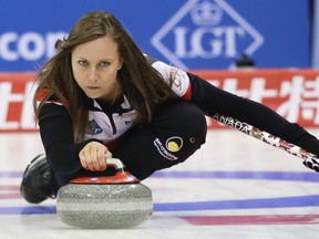 Rachel Homan prepares to release the stone during Canada's match against Scotland in the world women's curling championship at Beijing on Tuesday.