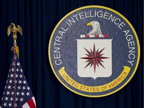 FILE - This April 13, 2016 file photo shows the seal of the Central Intelligence Agency at CIA headquarters in Langley, Va. A federal judge said Thursday, Jan. 19, 2017 that he's inclined to allow trial for a lawsuit against two psychologists who designed the CIA's harsh interrogation methods for the war on terror. The American Civil Liberties Union sued the psychologists on behalf of three former detainees, who claim they were tortured in CIA prisons.