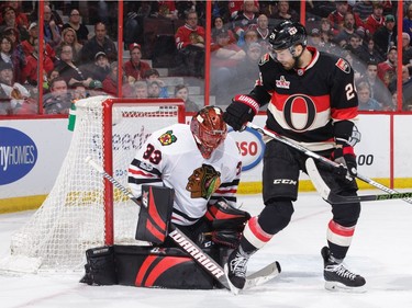 OTTAWA, ON - MARCH 16: Viktor Stalberg #24 of the Ottawa Senators watches the loose puck as Scott Darling #33 of the Chicago Blackhawks makes a save in the second period at Canadian Tire Centre on March 16, 2017 in Ottawa, Ontario, Canada.