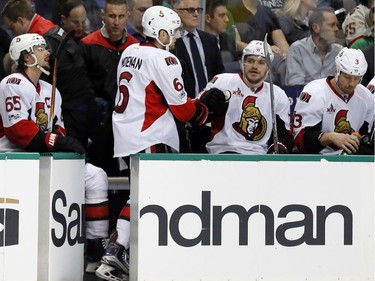 Ottawa Senators' Chris Wideman (6) is congratulated on the bench after scoring against the Dallas Stars in the first period of an NHL hockey game in Dallas, Wednesday, March 8, 2017.